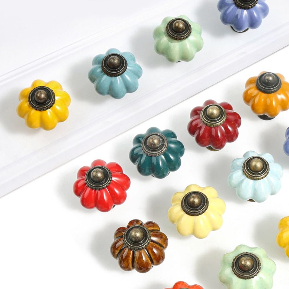 シンプルな単穴セラミックパンプキンハンドルヨーロピアンスタイ - Cabinet Knob Round のレビューと価格